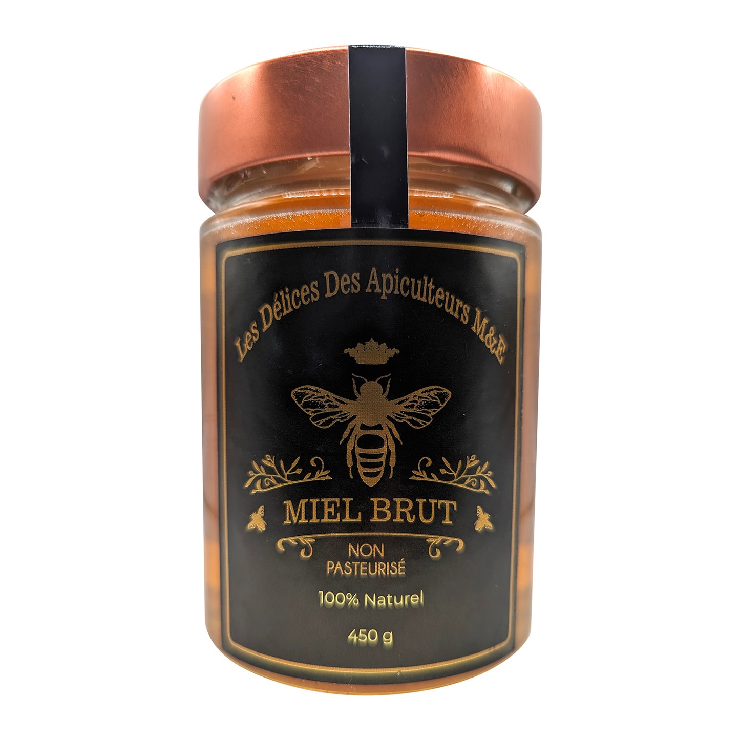 A glass jar of Beekeeper's Amber Wildflower Honey by Mielbrut.com, with a copper lid and black-gold label featuring a bee illustration. The label reads: "Beekeeper's Amber Wildflower Honey, Unpasteurized, 100% Natural, 450g.